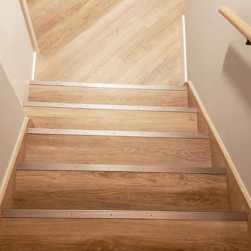 Flooring transformation done by Quality Carpets and Floors, in the Lansing, IN area