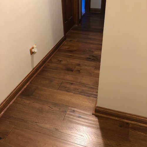 Flooring transformation done by Quality Carpets and Floors, in the Lansing, IN area